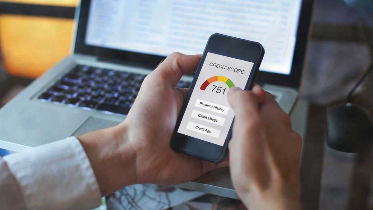 credit score concept on the screen of smartphone - stock photo