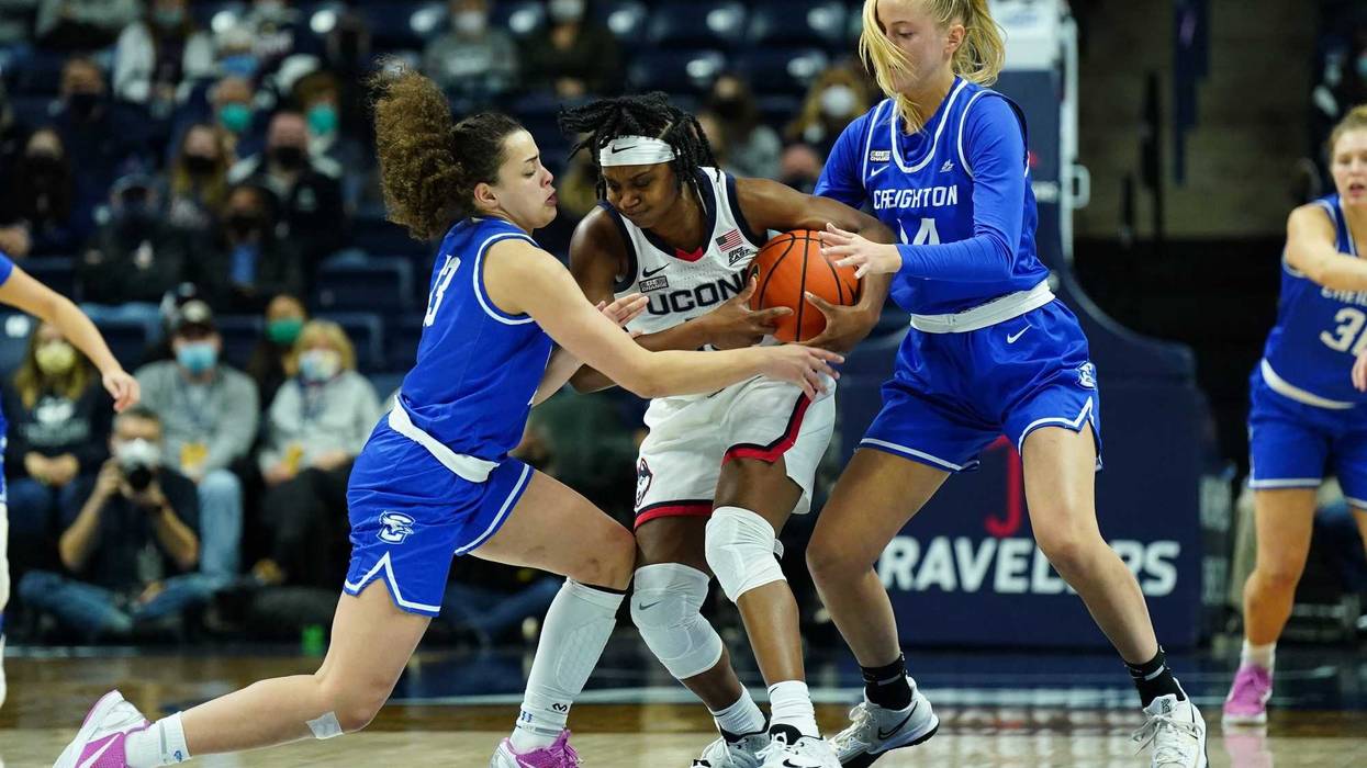Creighton Bluejays guard Rachael Saunders (13) and forward Mallory Brake (14) defend against UConn Huskies guard Christyn Williams (13) in the second half at Gampel Pavilion