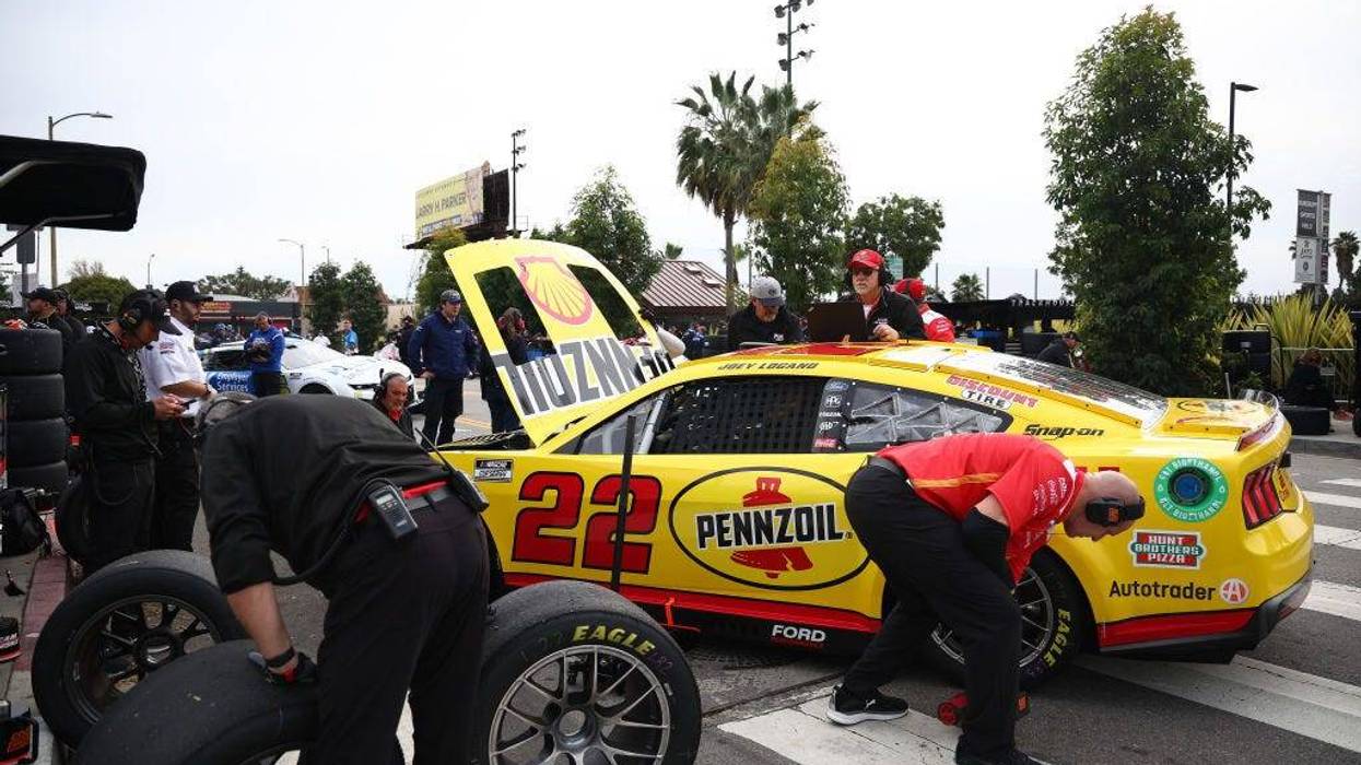 Crew members prepare the #22 Shell Pennzoil Ford, driven by Joey Logano to practice for the NASCAR Cup Series Busch Light Clash at The Coliseum at Los Angeles Memorial Coliseum on February 03, 2024 in Los Angeles, California. (Photo by Jared C. Tilton/Getty Images)