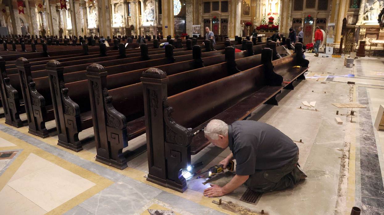 Crews are hard at work restoring the OLV National Shrine and Basilica in Lackawanna in anticipation of its 100th anniversary. Crews are working on restoring pews and marble floors.
