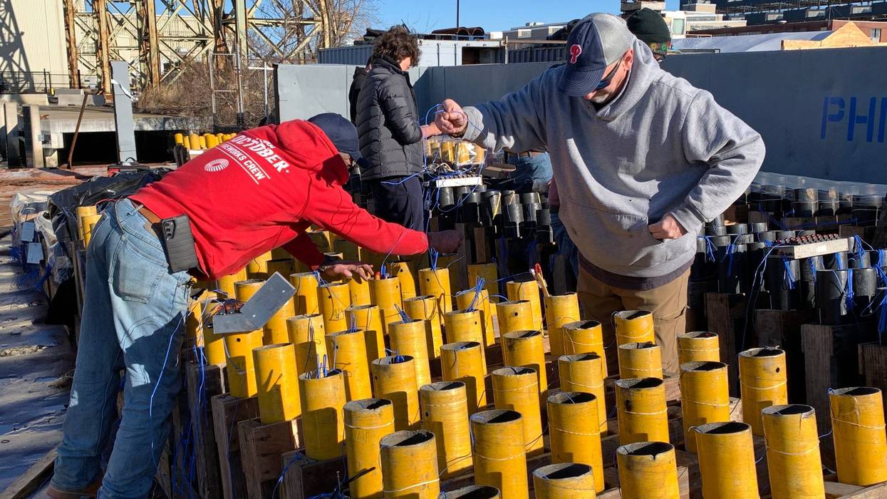 Crews at the Navy Yard prepare fireworks for New Year's Eve 2024.