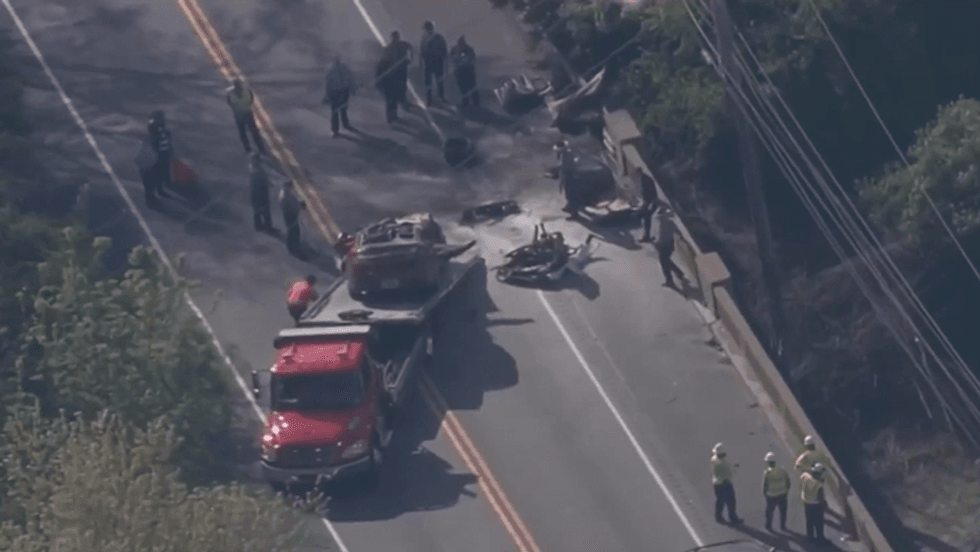 Crews clear the scene of deadly crash Wednesday on Route 322 in Delaware County..