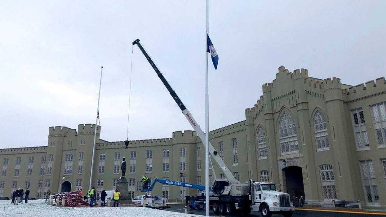 Crews prepare to remove a statue of Confederate Gen. Thomas "Stonewall" Jackson from the campus of the Virginia Military Institute on Monday, Dec. 7, 2020, in Lexington, Va. (AP Photo/Sarah Rankin)