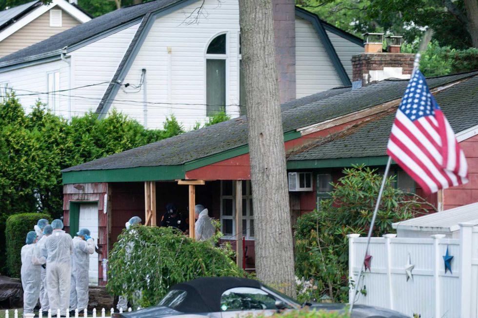 Crime laboratory officers arrive to the house of Rex Heuermann in Massapequa Park in connection with a long-unsolved string of killings, known as the Gilgo Beach murders on Friday, July 14, 2023