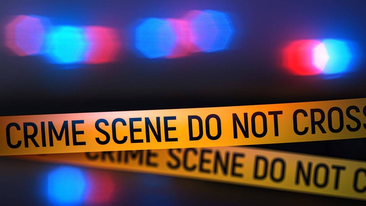 Crime scene police tape with flashing lights - stock photo