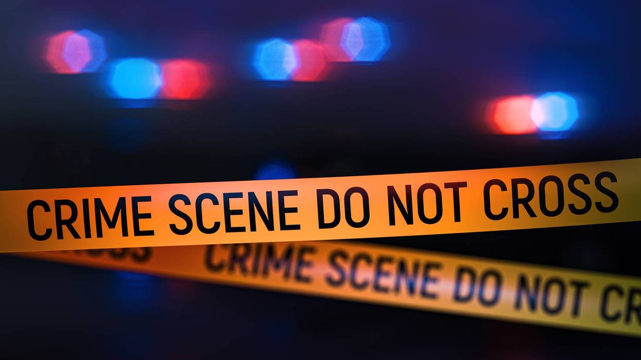 Crime scene police tape with flashing lights