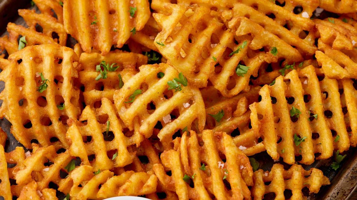 Crisscross potato lattices, golden waffle fries with sea salt and parsley
