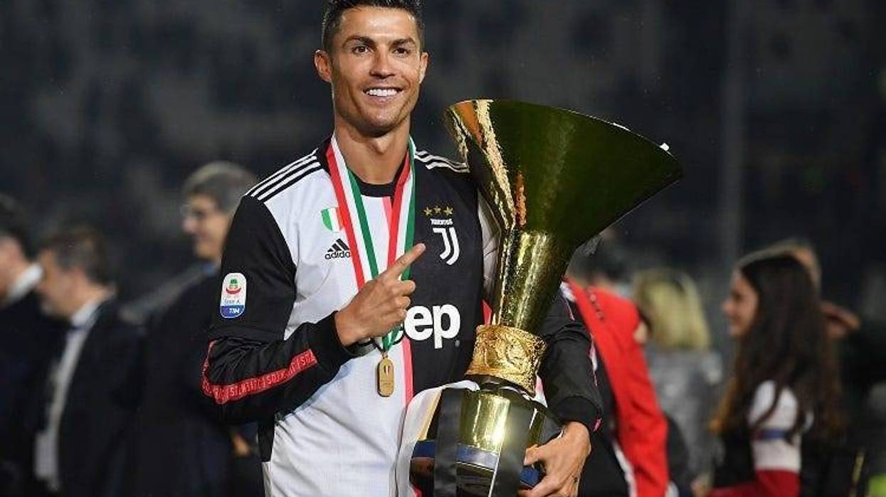 Cristiano Ronaldo of Juventus celebrates during the awards ceremony after winning the Serie A Championship during the Serie A match between Juventus and Atalanta BC on May 19, 2019 in Turin, Italy.