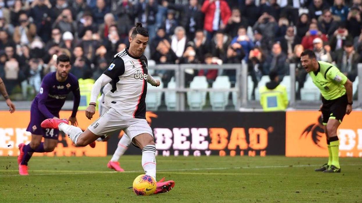 Cristiano Ronaldo of Juventus scores a penalty during the Serie A match between Juventus and ACF Fiorentina at Allianz Stadium on February 02, 2020 in Turin, Italy.