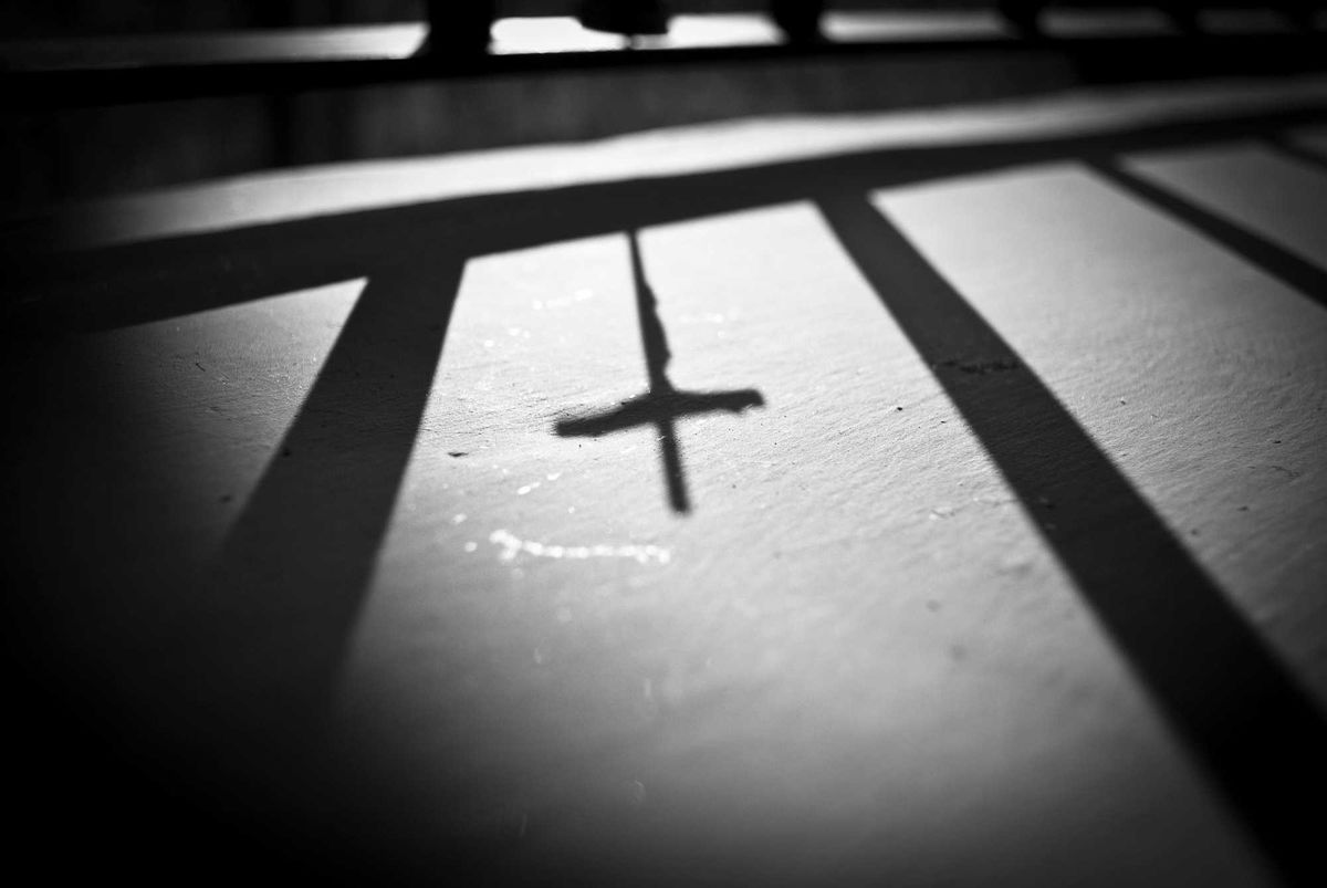 Cross and shadows stock photo.