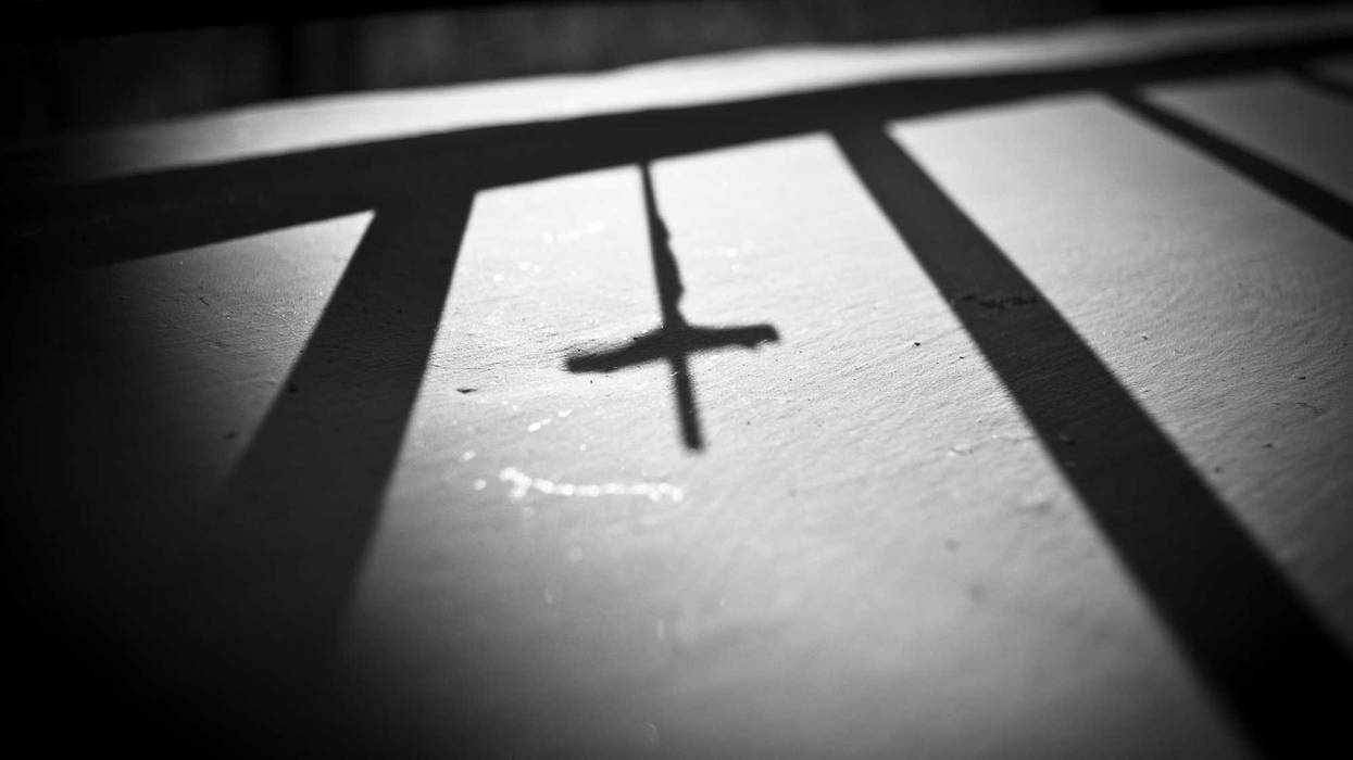 Cross and shadows stock photo.