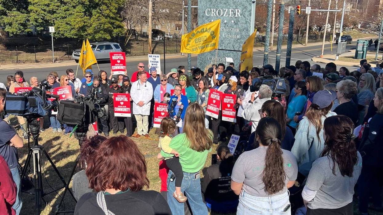 Crozer employees, community members and leaders rally in front of Crozer Chester Medical Center.