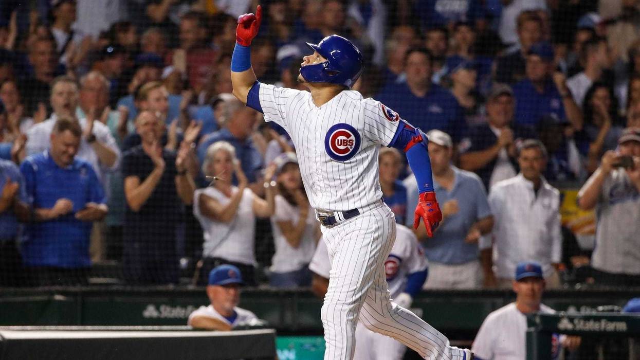 Cubs catcher Willson Contreras rounds the bases after homering.