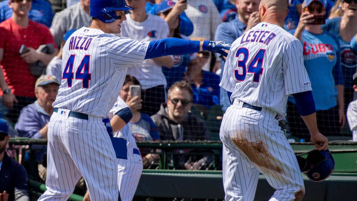 Cubs first baseman Anthony Rizzo (44) and left-hander Jon Lester (34) celebrate.