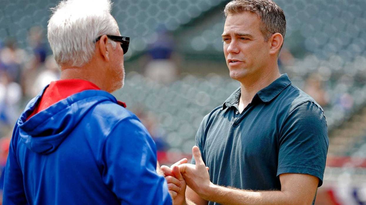 Cubs manager Joe Maddon, left, and president of baseball operations Theo Epstein have a conversation in 2015.