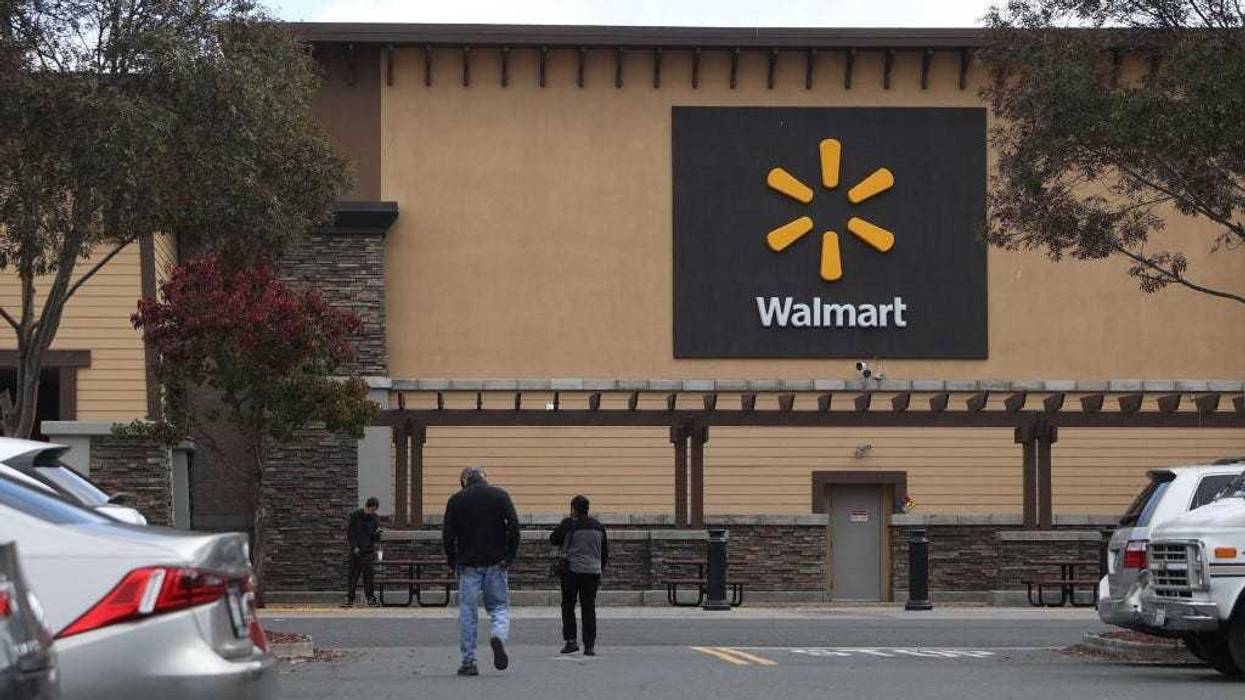 Customers enter a Walmart store on November 16, 2021 in American Canyon, California.