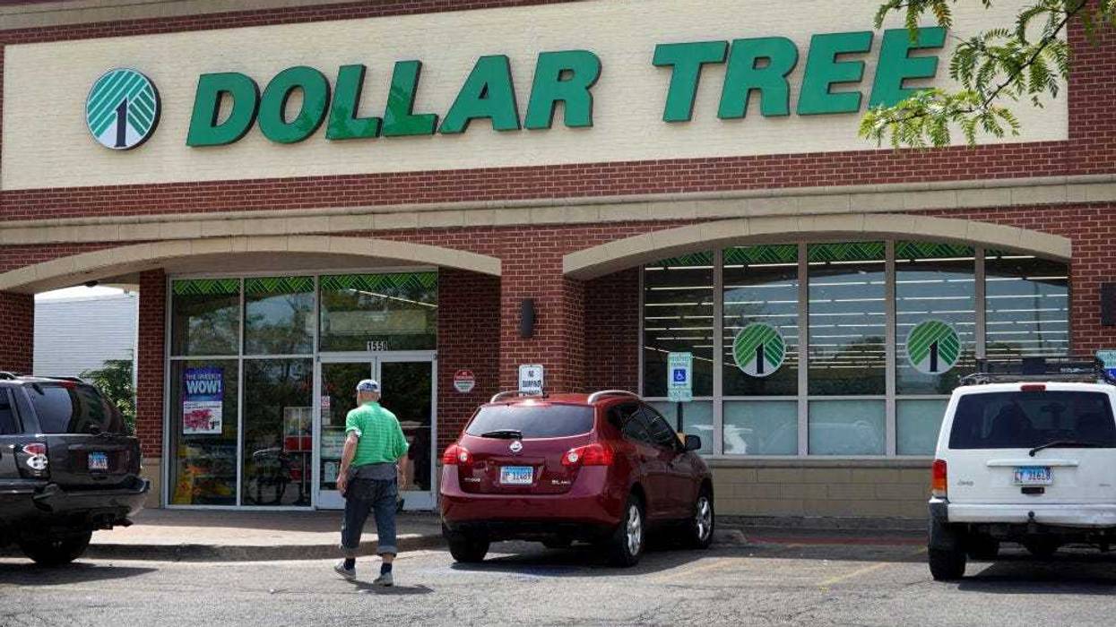 Customers shop at a Dollar Tree store in the Austin neighborhood on August 02, 2022 in Chicago, Illinois. Discount stores have seen a double digit increase in business as higher income shoppers look to the stores for a hedge against inflation that continues to chip away at their buying power. (Photo by Scott Olson/Getty Images)