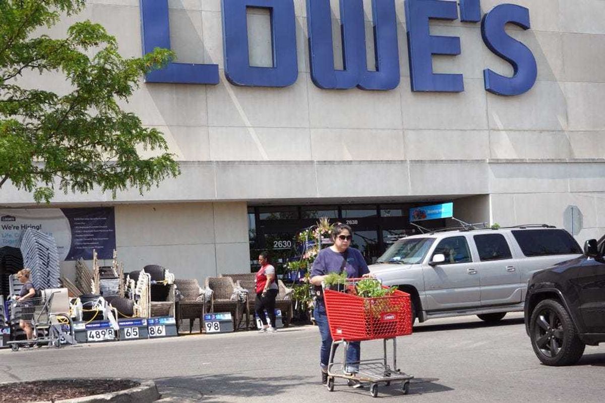 Customers shop at a Lowe's store on May 23, 2023 in Chicago, Illinois.