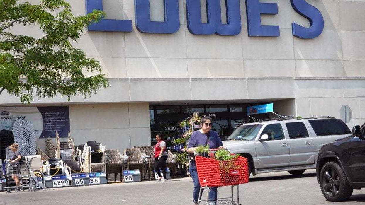 Customers shop at a Lowe's store on May 23, 2023 in Chicago, Illinois.