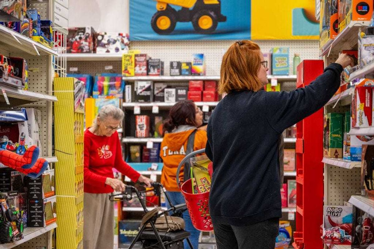 Customers shop for holiday gifts in a Target store on December 21, 2023 in Austin, Texas. People continue last-hour shopping and preparations as the holiday season draws nearer. (Photo by Brandon Bell/Getty Images)