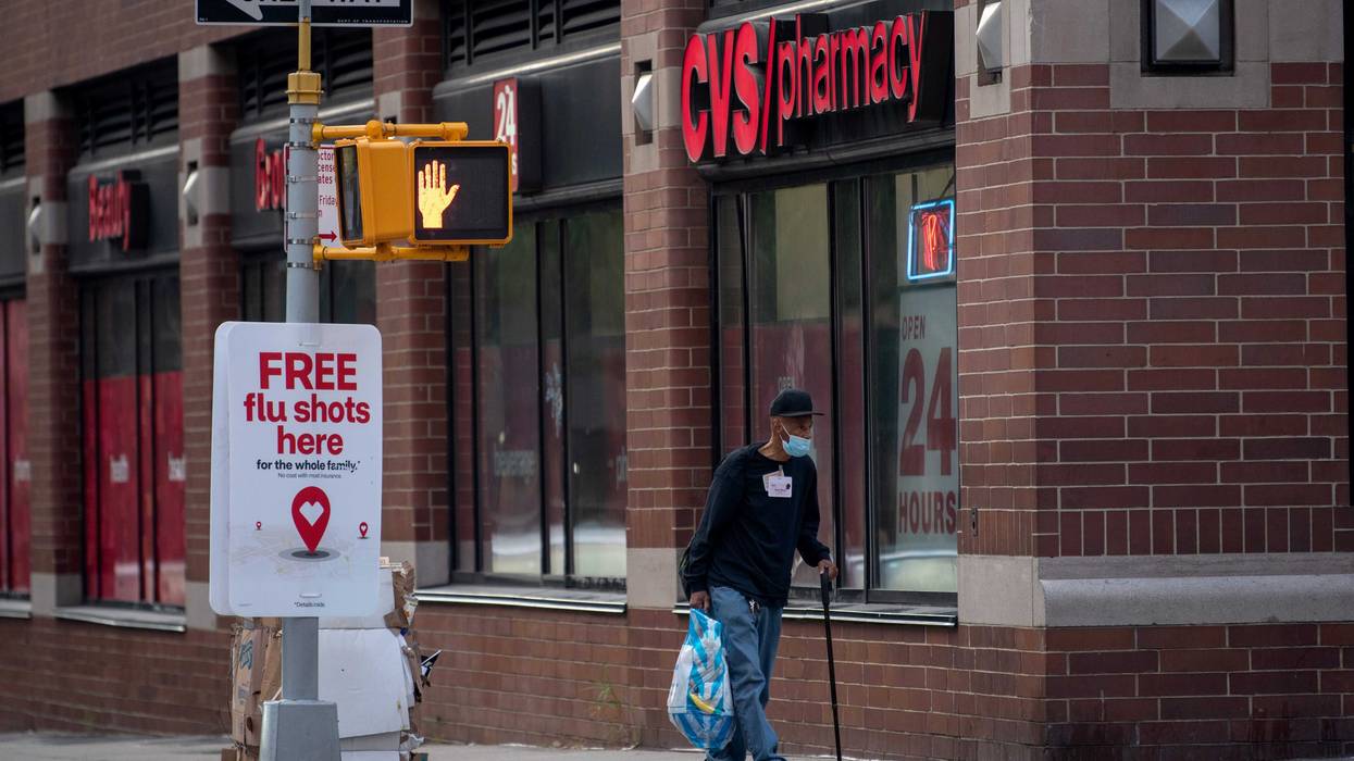 CVS pharmacy in New York with flu shot sign out front