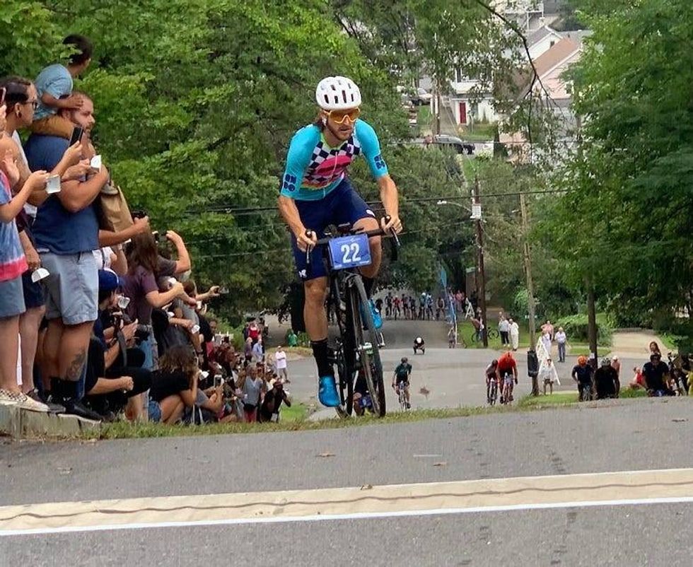 cyclist at top of hill