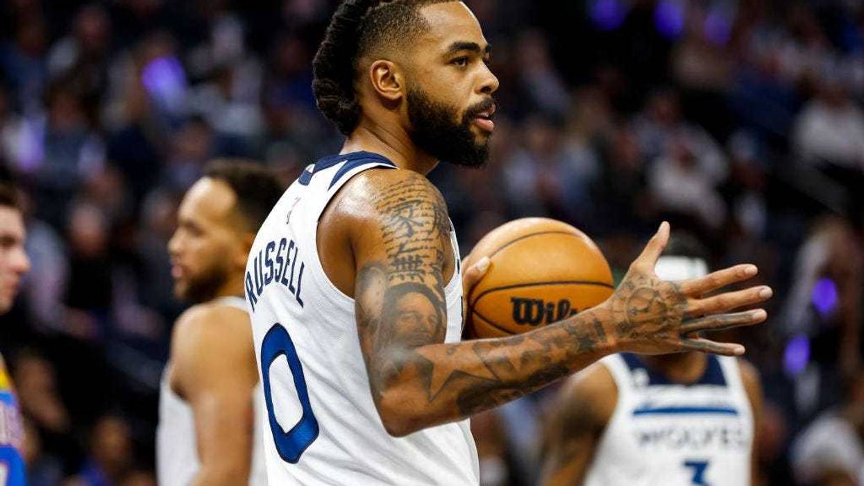 D'Angelo Russell #0 of the Minnesota Timberwolves looks on against the Oklahoma City Thunder in the first quarter of the game at Target Center on October 19, 2022 in Minneapolis, Minnesota. The Timberwolves defeated the Thunder 115-108.