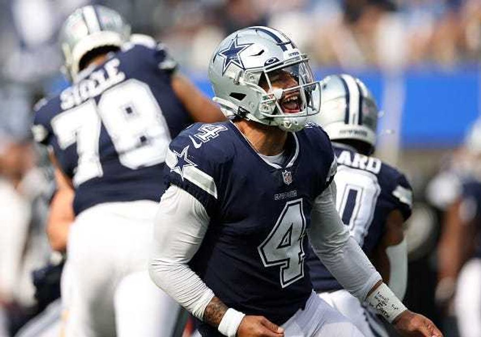 Dak Prescott celebrates a Cowboys score