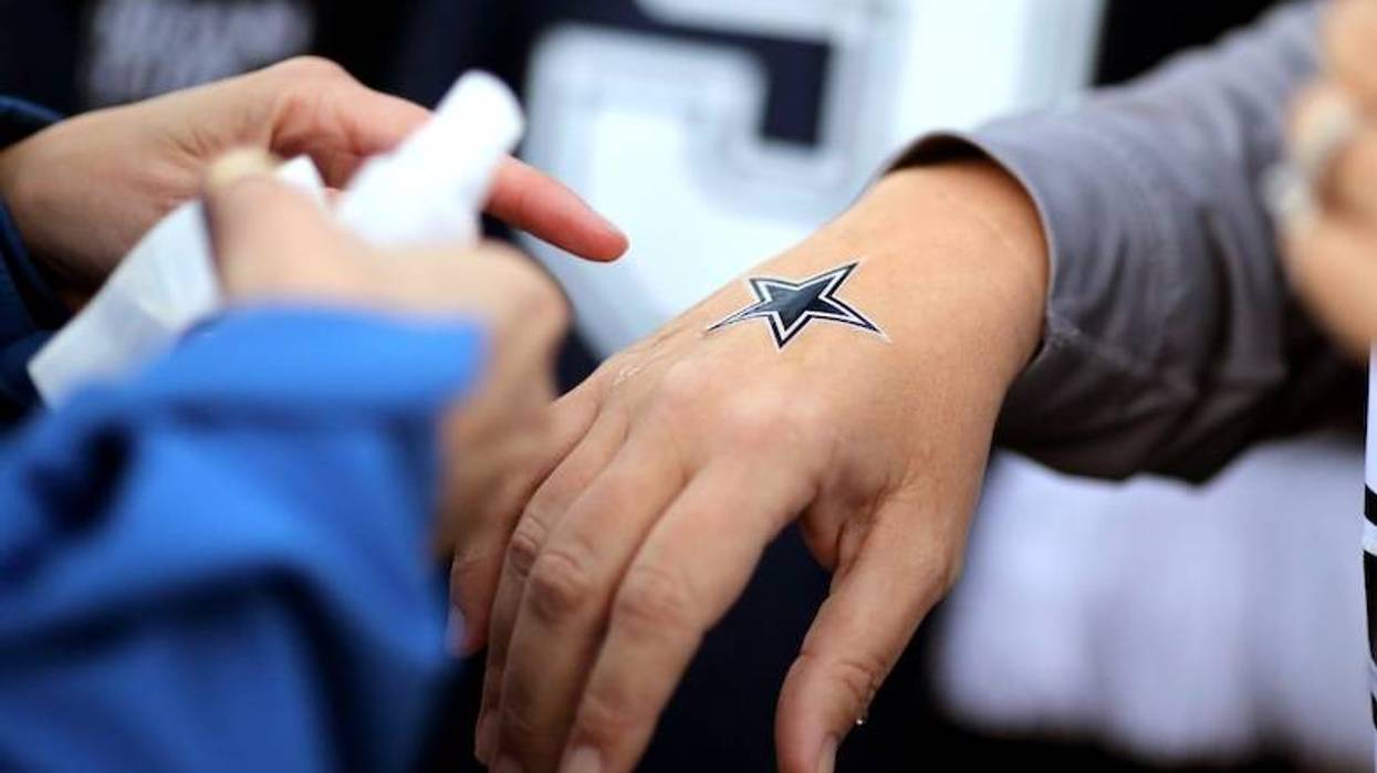 Dallas Cowboys fan with a star temporary tattoo