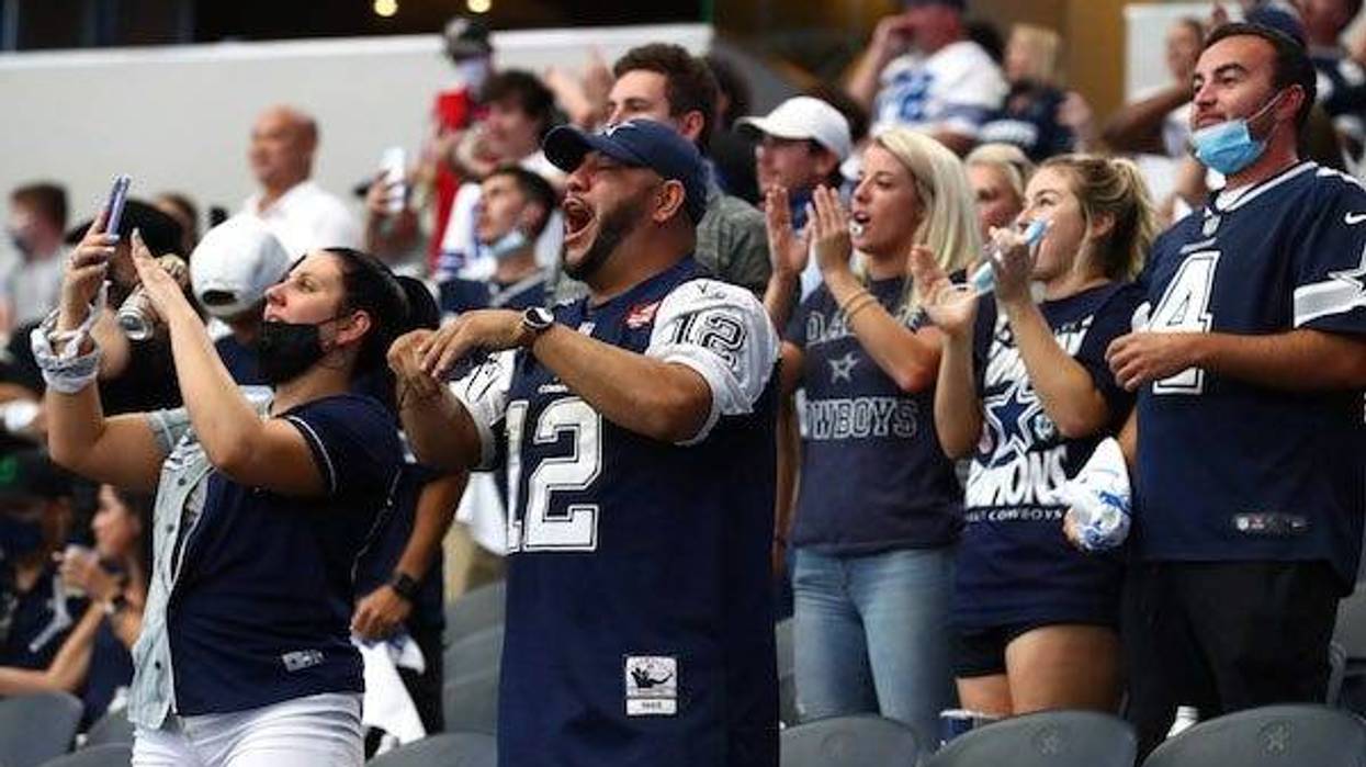 Dallas Cowboys fans cheering during game against the Atlanta Falcons at AT&T Stadium
