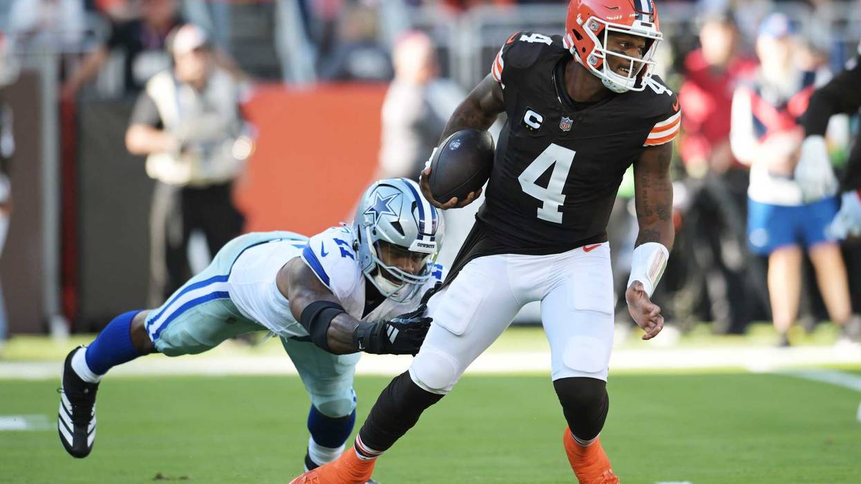 Dallas Cowboys linebacker Micah Parsons (11) pressures Cleveland Browns quarterback Deshaun Watson (4) during the first quarter at Huntington Bank Field.