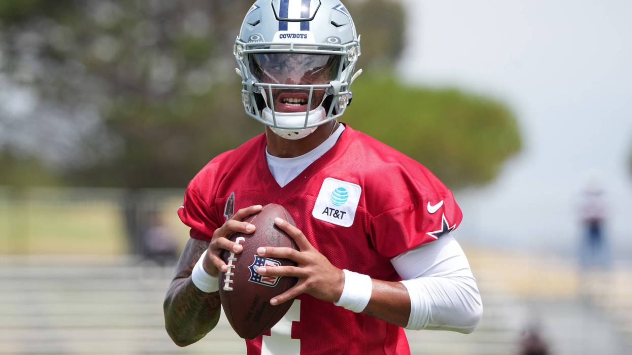 Dallas Cowboys quarterback Dak Prescott (4) throws the ball during training camp at the River Ridge Fields.