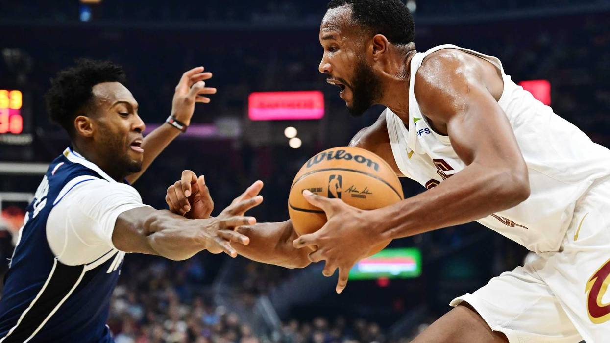 Dallas Mavericks forward Olivier-Maxence Prosper (8) defends against Cleveland Cavaliers forward Evan Mobley (4) during the first half at Rocket Mortgage FieldHouse.