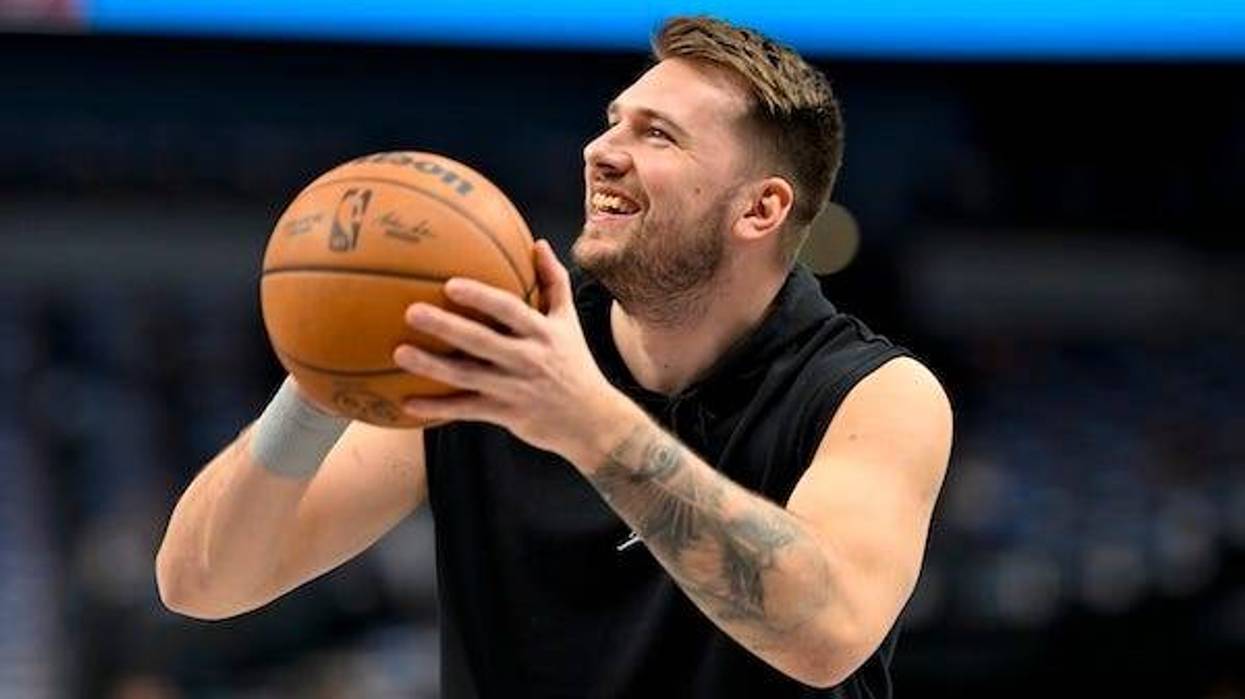 Dallas Mavericks guard Luka Doncic (77) warms up before the game between the Dallas Mavericks and the Portland Trail Blazers at the American Airlines Center