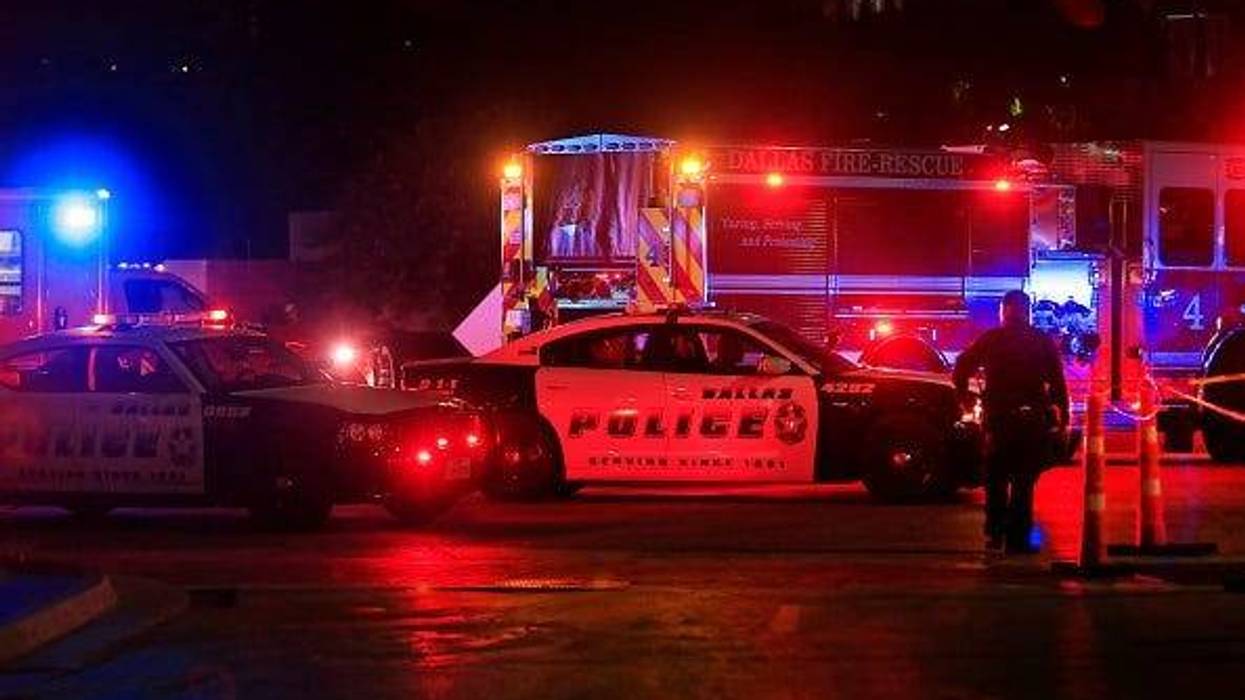 Dallas police work near the scene where eleven Dallas police officers were shot and five have now died on July 8, 2016 in Dallas, Texas. According to reports, shots were fired during a protest being held in downtown Dallas in response to recent fatal shoo