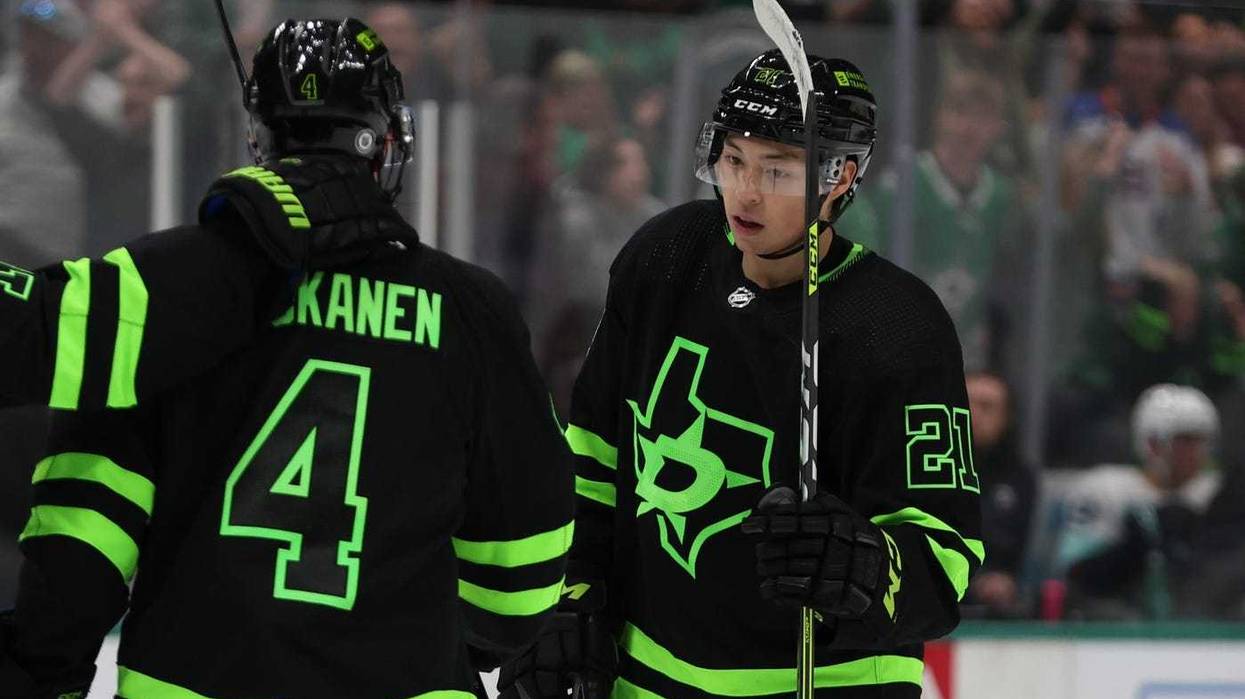 Dallas, Texas, USA; Dallas Stars left wing Jason Robertson (21) and defenseman Miro Heiskanen (4) celebrate a power play goal against the Seattle Kraken in the second period at American Airlines Center.