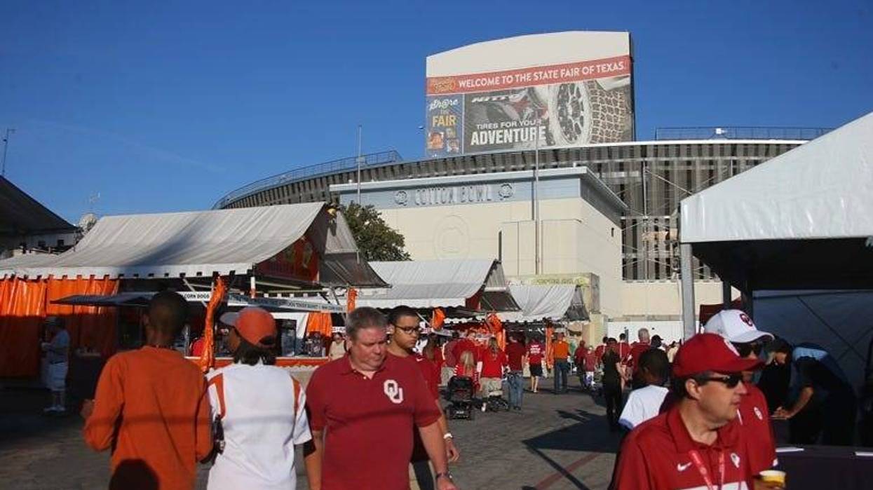 DALLAS, TX - OCTOBER 10: Fans walk through the State Fair of Texas before the 2015 AT&T Red River Showdown between the Texas Longhorns and the Oklahoma Sooners at Cotton Bowl on October 10, 2015 in Dallas, Texas. (
