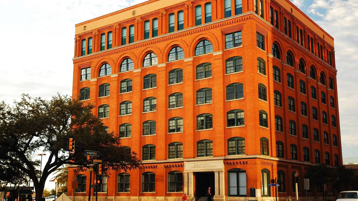 Dallas, TX, USA November 4, 2008 A full view of the Texas School Book Depository Building shows the sixth story window from where Lee Harvey Oswald shot John F Kennedy