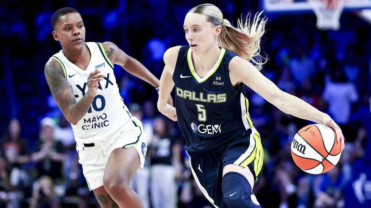 Dallas Wings guard and Minnesota's own Paige Bueckers (5) dribbles as Minnesota Lynx guard Courtney Williams (10) defends during the second half at College Park Center.