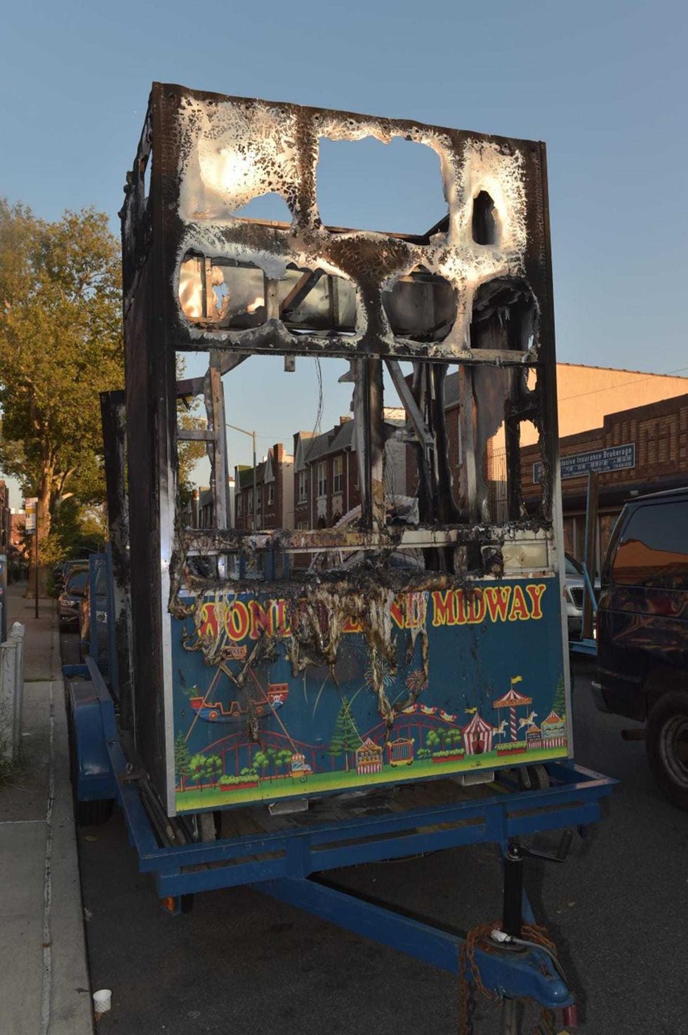 Damage to the ticket booth at the 18th Avenue Feast of Santa Rosalia in Brooklyn on August 24th, 2021, after a man set the structure on fire.