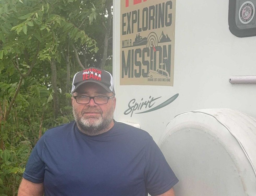 Dan Pritchard uses kayaks equipped with sonar to search underwater