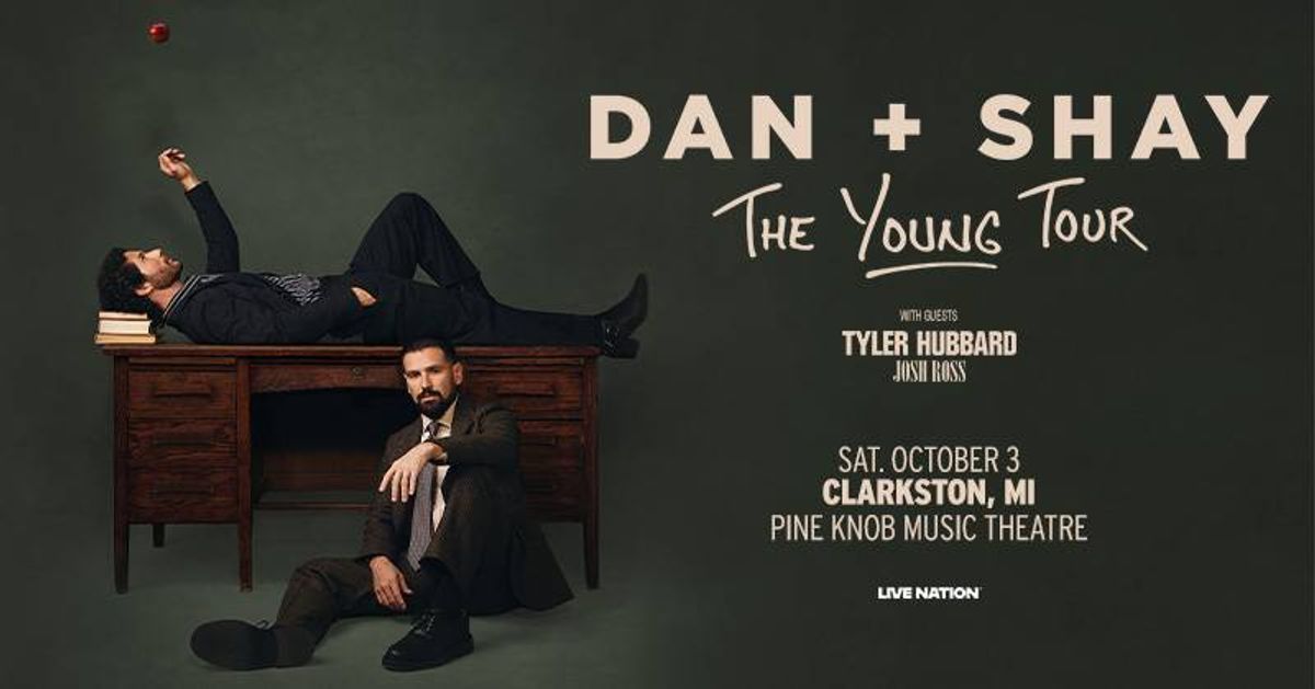 Dan + Shay 'The Young Tour' poster featuring the duo, one on a desk reaching for a floating apple.
