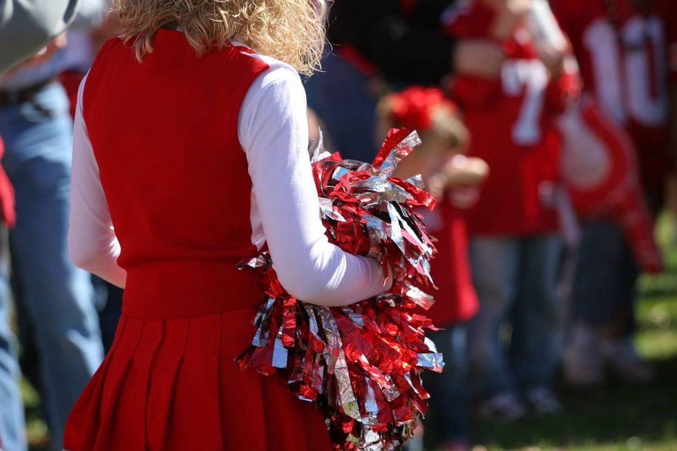 Dancing Priest Steals the Show at High School Pep Rally