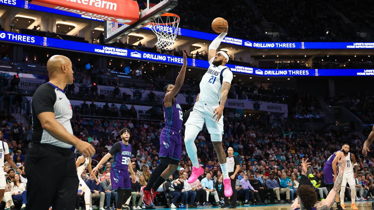 Daniel Gafford #21 of the Dallas Mavericks dunks the ball during the first half of a basketball game against the Charlotte Hornets at Spectrum Center on Jan. 20, 2025, in Charlotte, North Carolina.