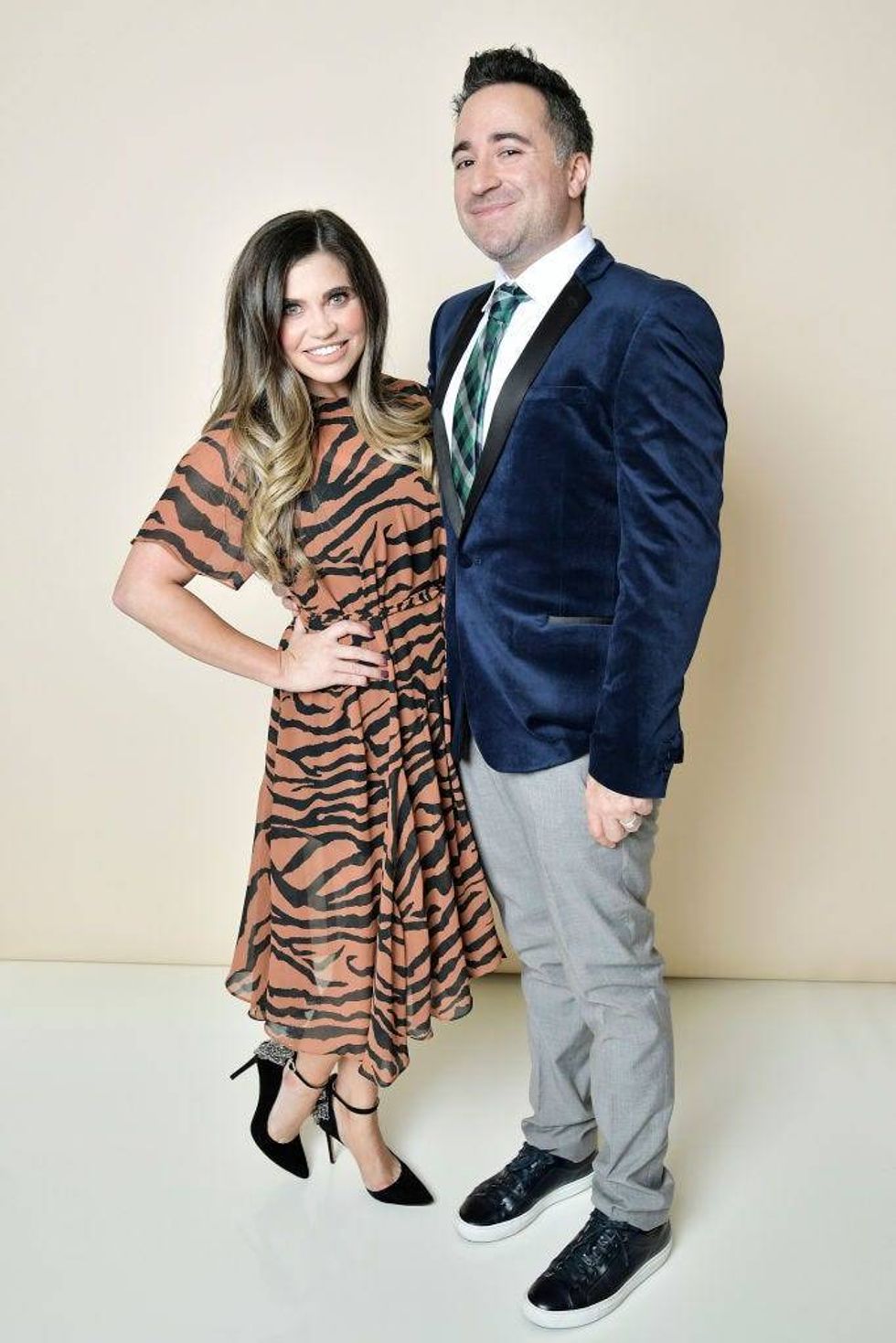 Danielle Fishel and Jensen Karp pose for a portrait in the Getty Images & People Magazine Portrait Studio at Hallmark Channel and American Humanes 2019 Hero Dog Awards at the Beverly Hilton on October 05, 2019 in Beverly Hills, California.