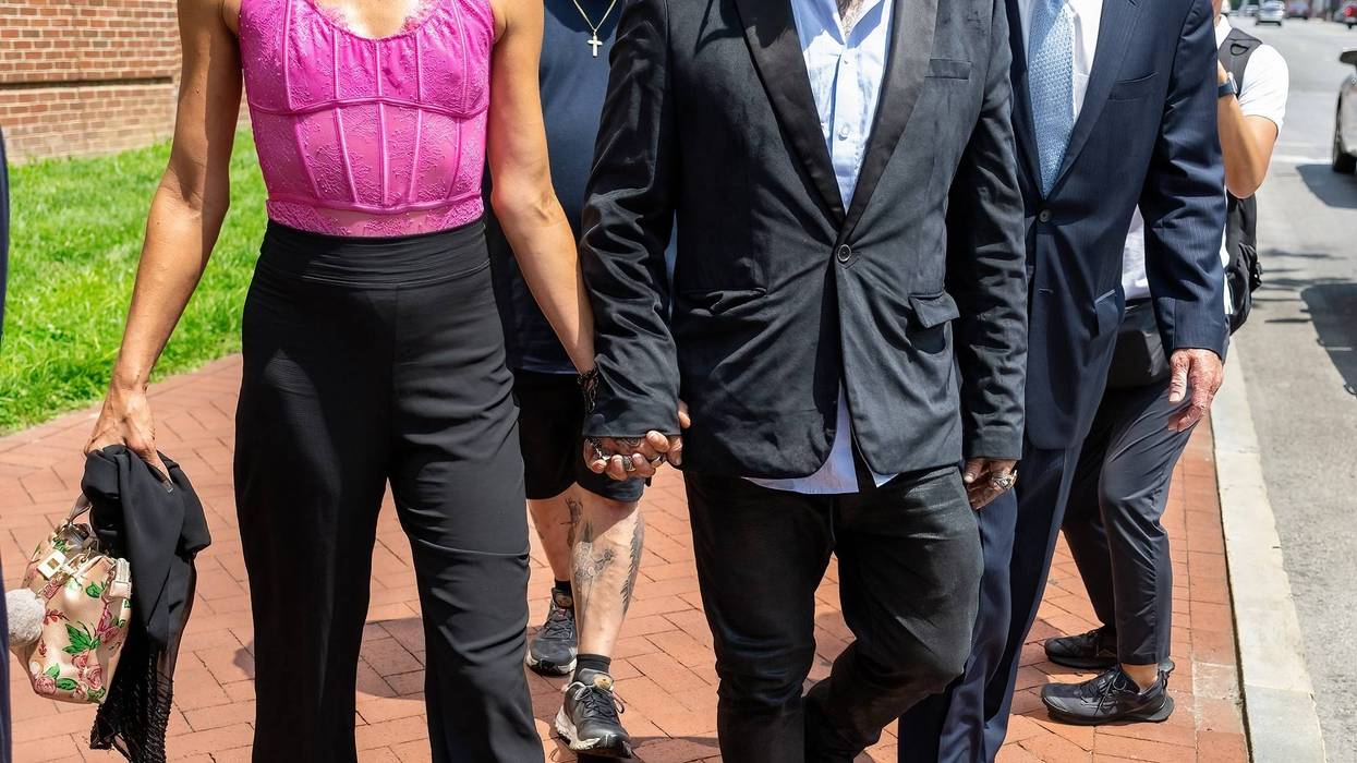 Dannii Marie, Bam Margera (center) and his attorney Michael T. van der Veen (right) are seen arriving at Chester County Justice Center on July 27, 2023.