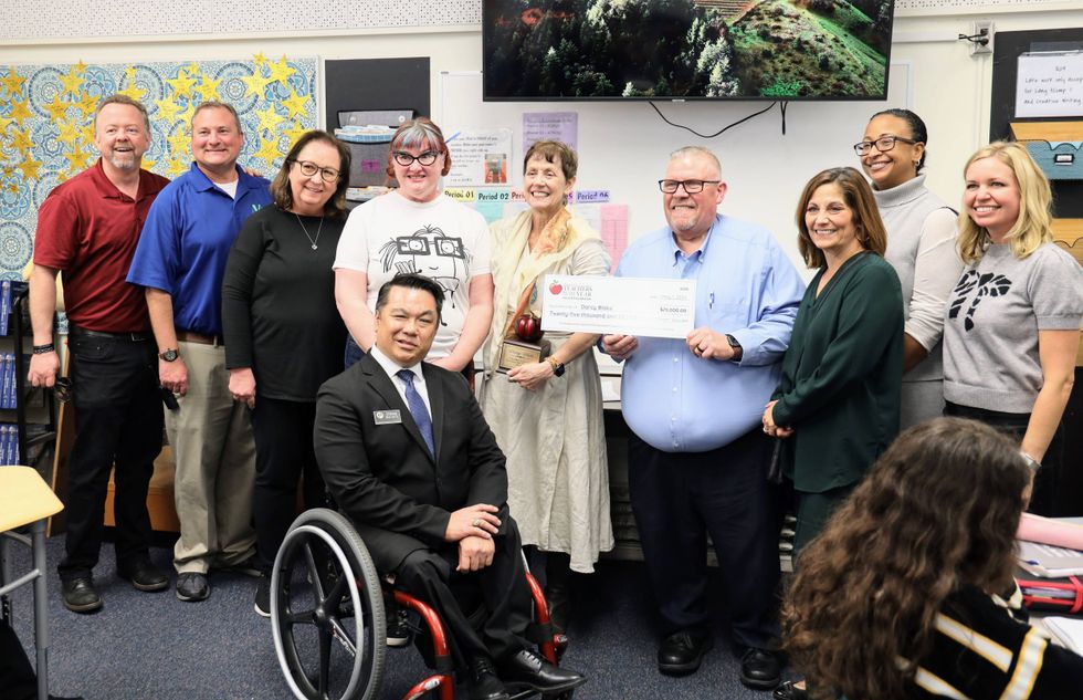 Darcy Blake in the middle with Ladera Vista and district colleagues.