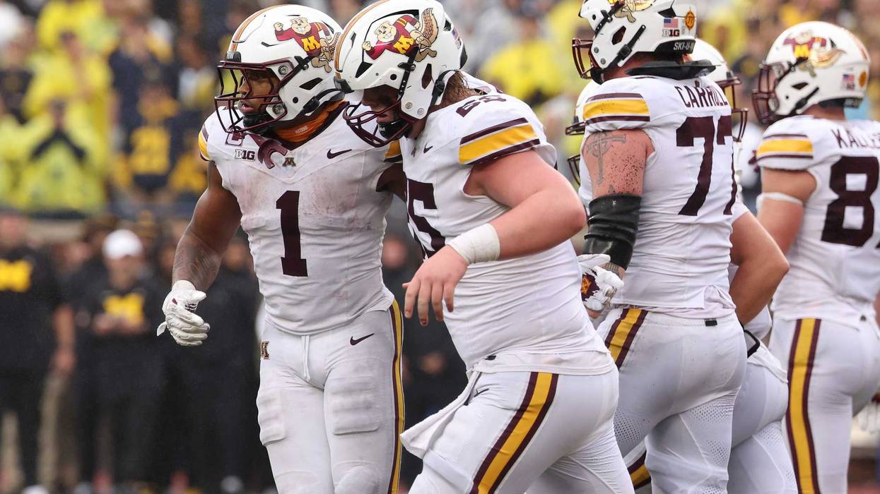 Darius Taylor #1 of the Minnesota Golden Gophers celebrates his second half touchdown with teammates while playing the Michigan Wolverines at Michigan Stadium on September 28, 2024 in Ann Arbor, Michigan.