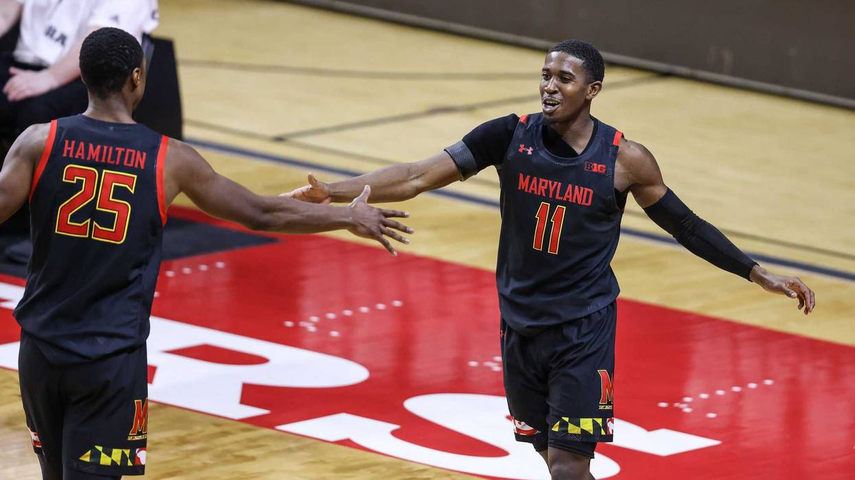 Darryl Morsell and Jarius Hamilton celebrate a big play during MD's 68-59 win over Rutgers.