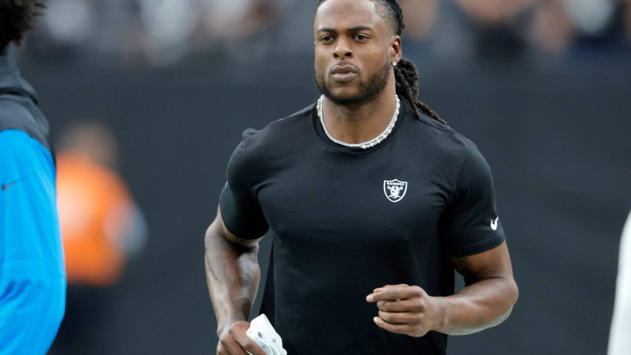 Davante Adams #17 of the Las Vegas Raiders warms up before a game between the Las Vegas Raiders and Carolina Panthers at Allegiant Stadium on September 22, 2024 in Las Vegas, Nevada